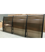 Savienots polikarbonāta jumtiņš 1400x3000 mm  tonēts, melni turētāji